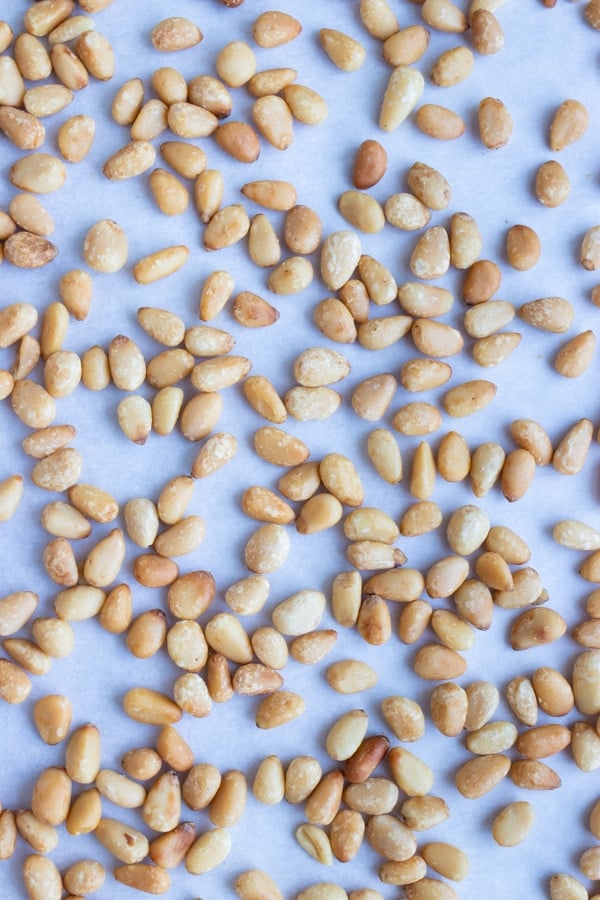 Roasted pine nuts are a golden brown color with a buttery, nutty flavor.