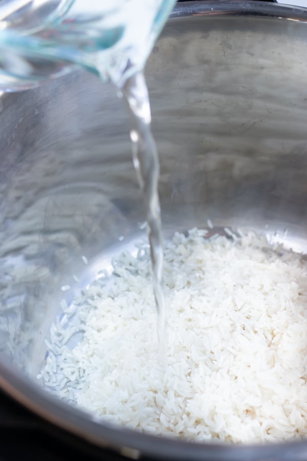 Add liquids to your rinsed rice in the instant pot for this recipe.