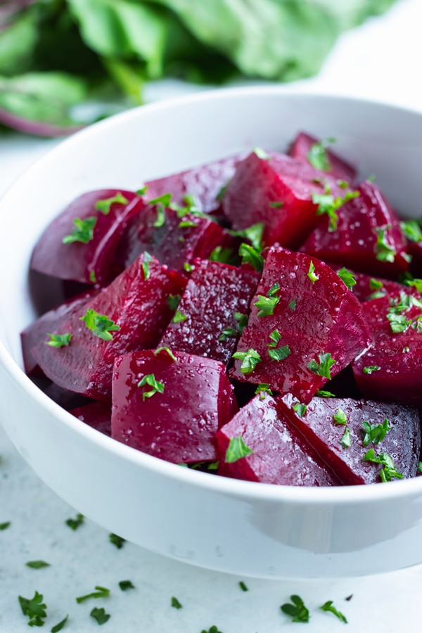Roasted beets are peeled and chopped before using in recipes.