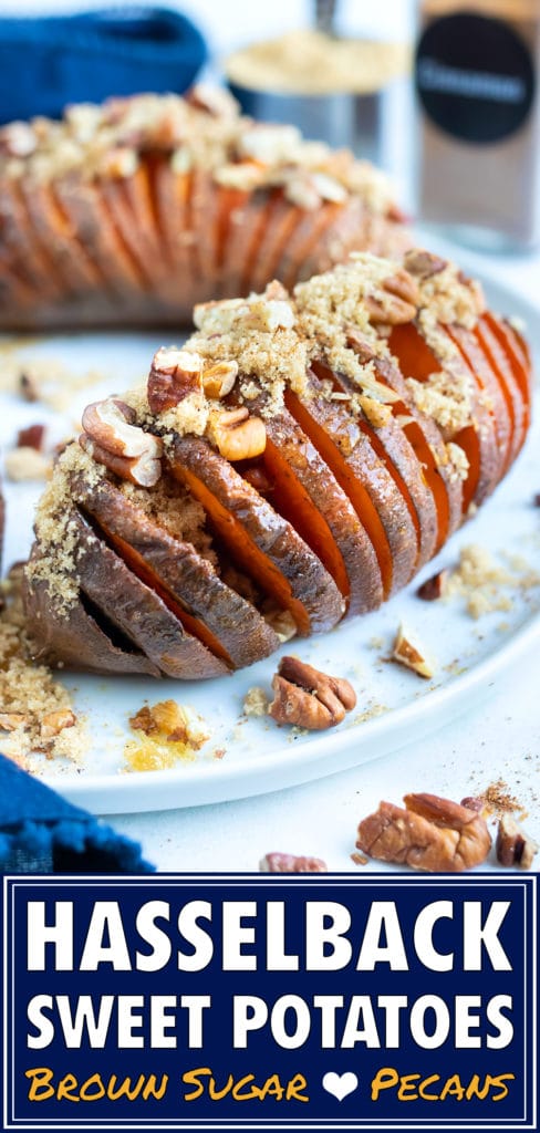 Hasselback sweet potatoes are served on a plate and topped with brown sugar and cinnamon.