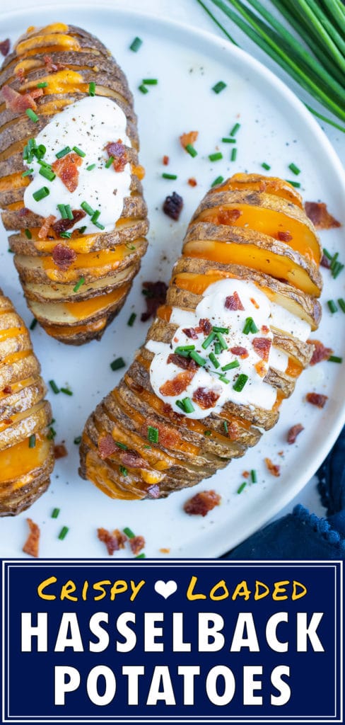 Loaded Hasselback Potatoes are topped with bacon, cheese, and sour cream are added to the top.