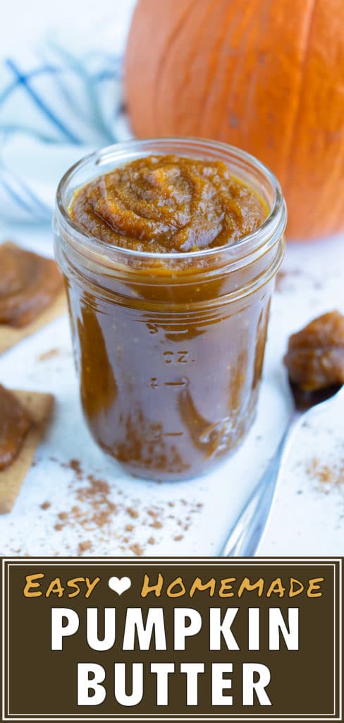 Creamy pumpkin butter is stored in a glass jar on the counter.