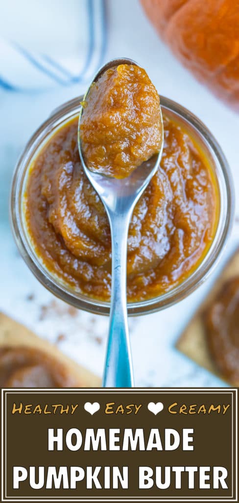 Vegan pumpkin butter is lifted by a spoon before spreading on a piece of bread.