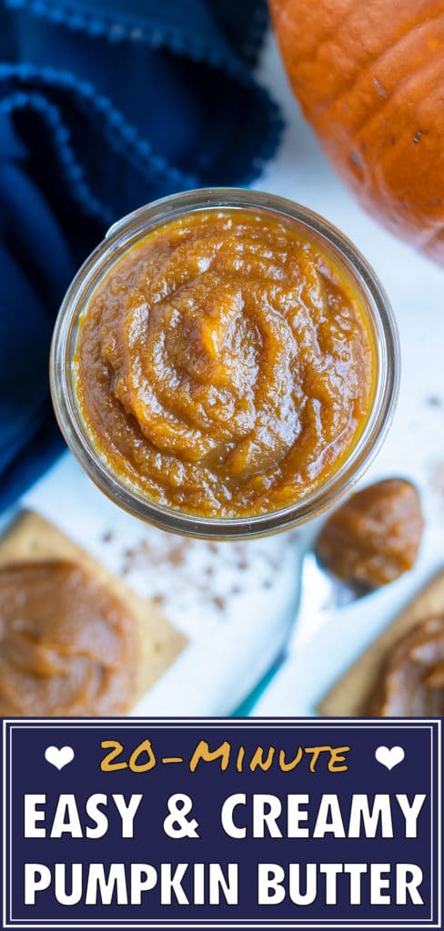 Smooth pumpkin butter in a jar is spread on biscuits for a fall snack.