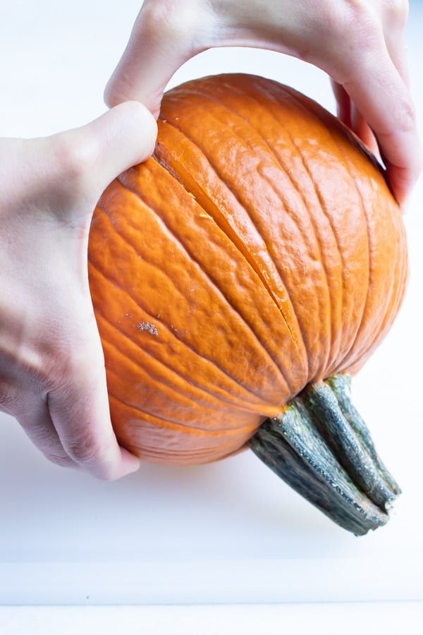 Pumpkin is separated before roasting in the oven.