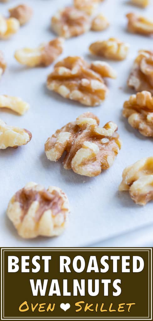 Raw walnuts are placed on a lined baking sheet and roasted in the oven.