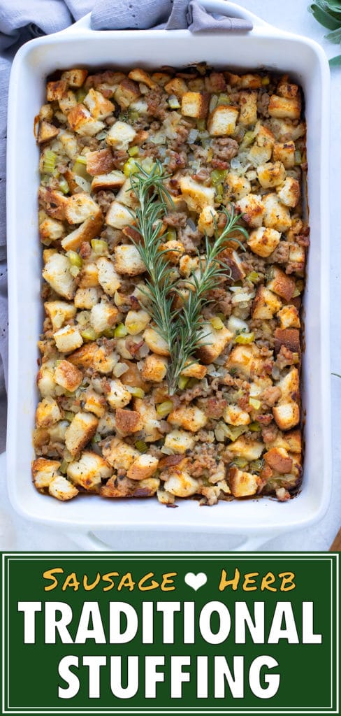 Sausage stuffing is served with a wooden spoon for a Thanksgiving side.