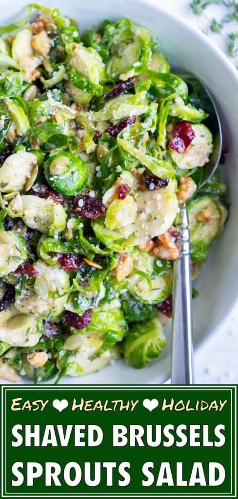 Shaved Brussels sprout salad is made with raw Brussels sprouts, cranberries, and toasted walnuts.