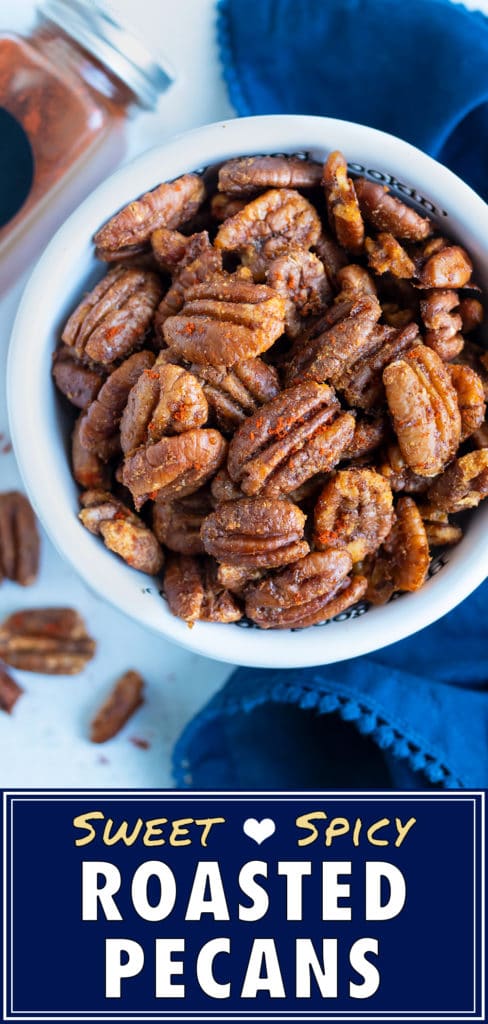 Cajun spiced pecan recipe is kept in a bowl on the counter for snacking.
