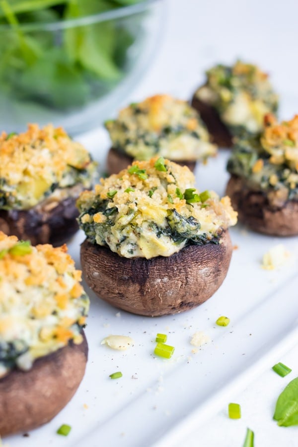 Filled mushrooms are served for a low-carb appetizer.