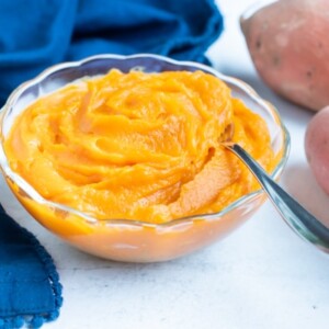 Sweet potato puree is placed in a bowl on the counter before being frozen for future recipes.