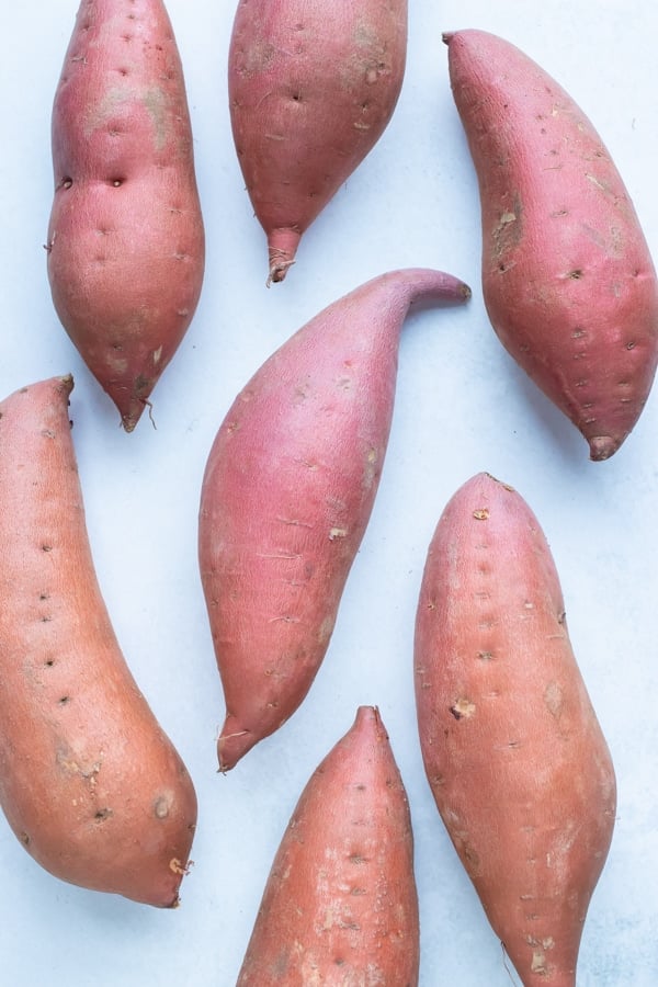 Sweet potatoes are shown on the counter before preparing for puree.