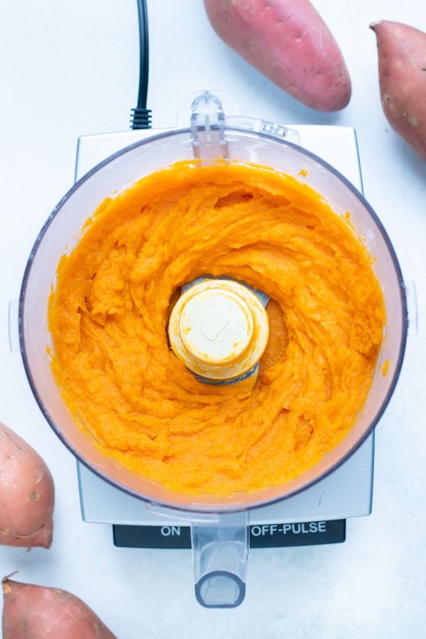 Sweet potatoes are pureed in the food processor for an easy homemade puree.
