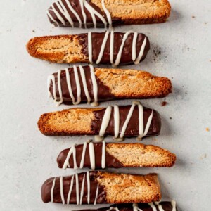 Gluten-free biscotti laying on a white table.