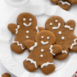 A plate full of gluten-free gingerbread cookies.