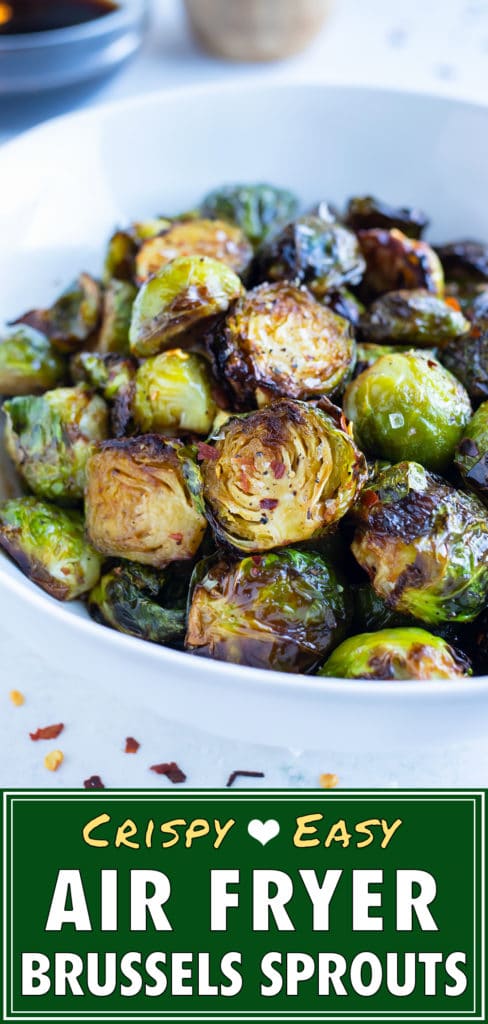 Air fryer roasted brussels sprouts are served in a white bowl.