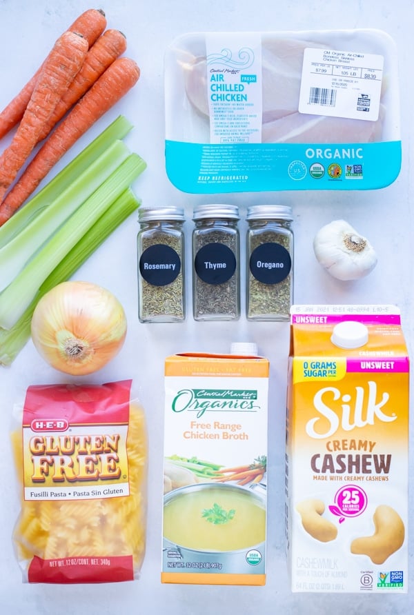 Almond milk, chicken broth, carrots, herbs, onion, celery, pasta, and chicken breast are the ingredients needed in this recipe.