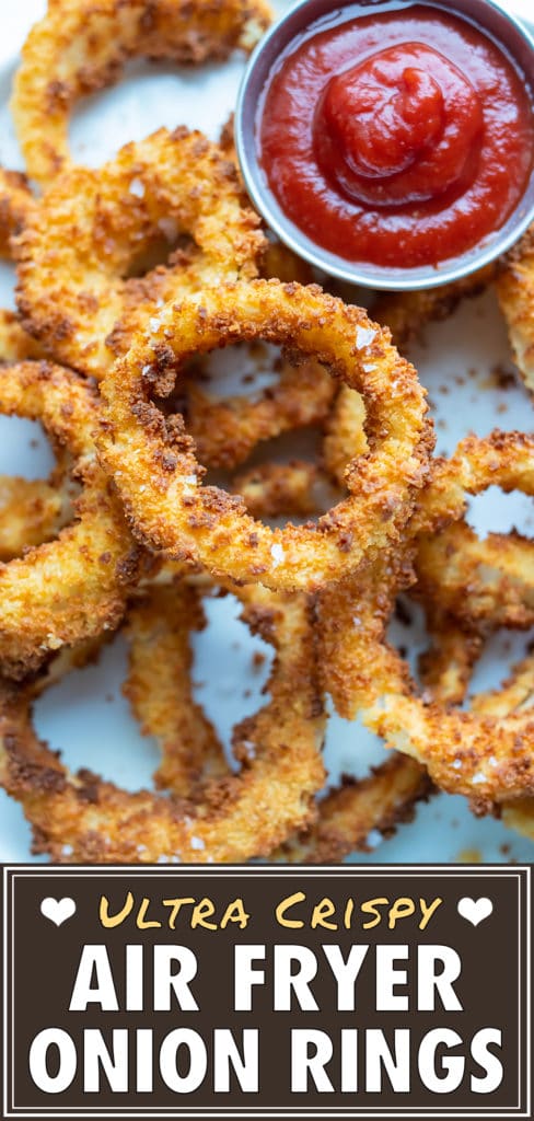 A plate of onion rings is set on the counter before enjoying with dip.