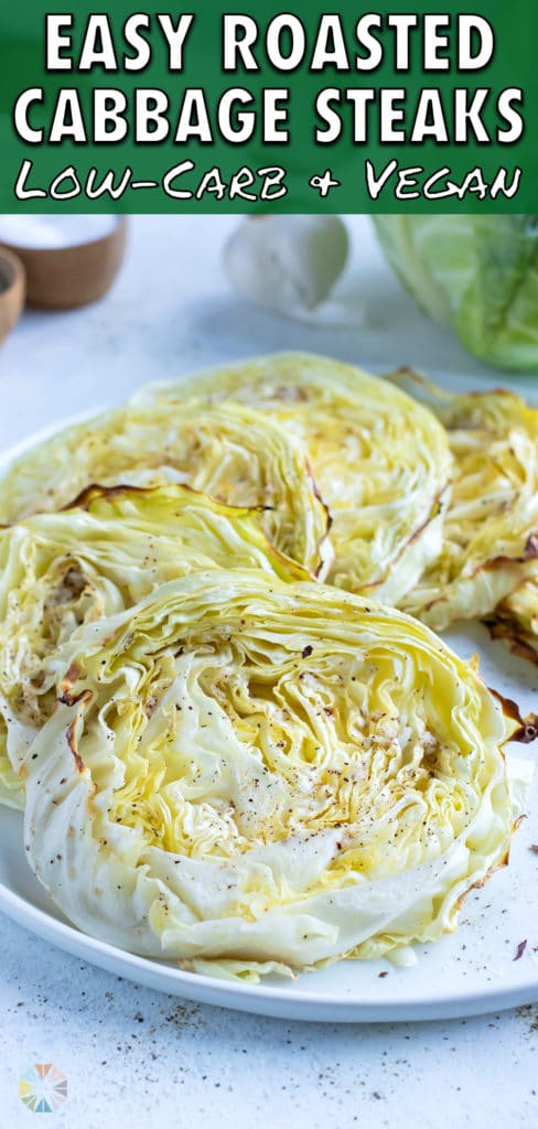 Cabbage steaks are served on as white plate as a low-carb side.