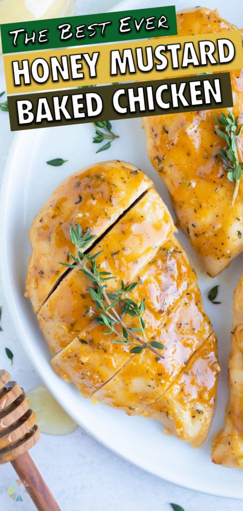 Baked chicken that has been coated in a honey mustard and thyme sauce and then cooked in the oven.