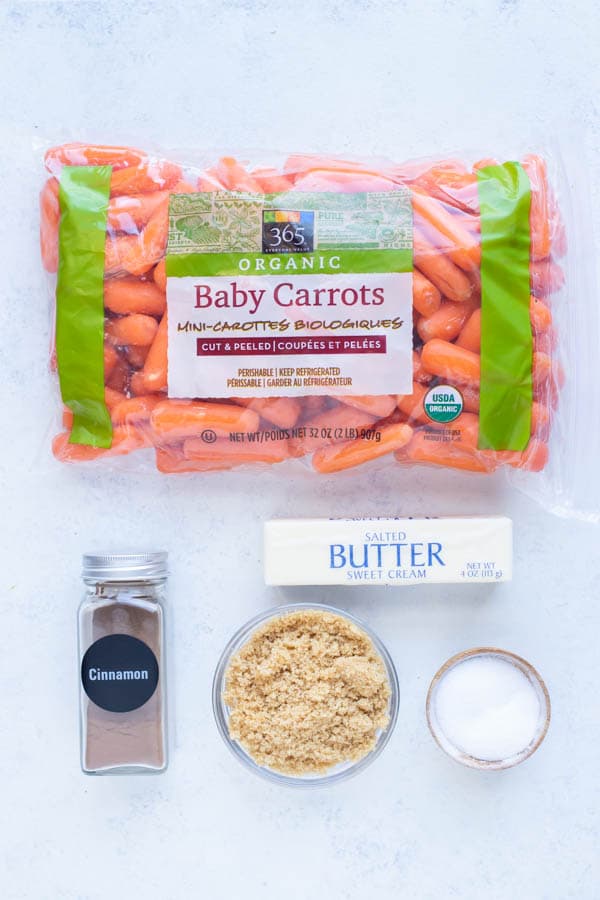Baby carrots, brown sugar, butter, cinnamon, and salt are the ingredients in this recipe.