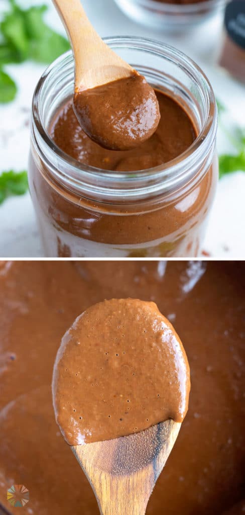 Mole sauce is lifted out of a pot with a wooden spoon.
