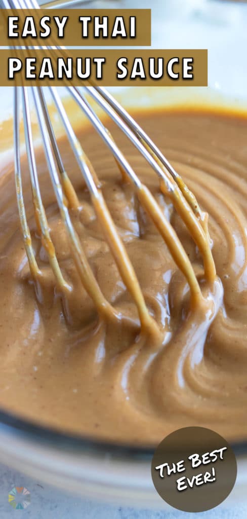 Thai peanut sauce is mixed with a whisk in a bowl.