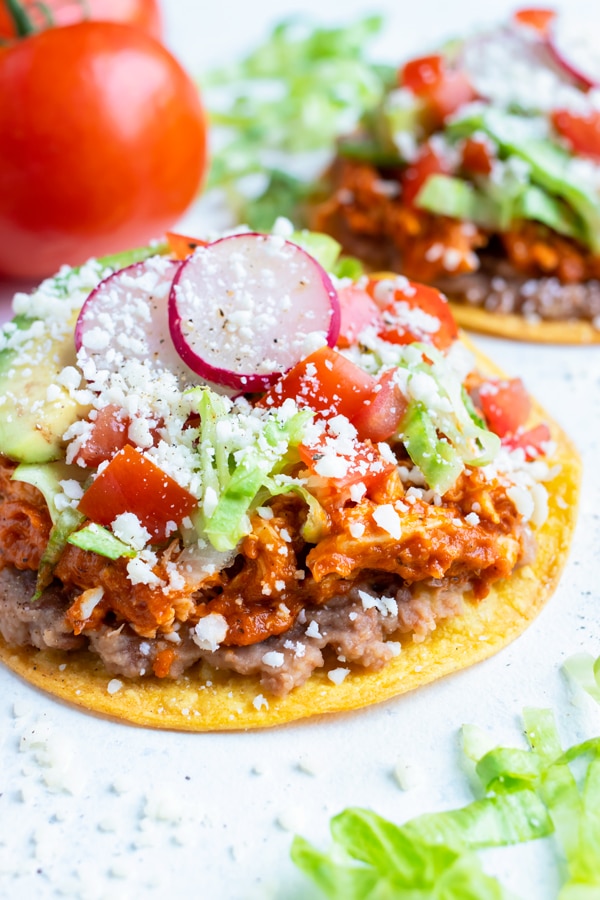 Easy chicken tostadas are loaded with toppings