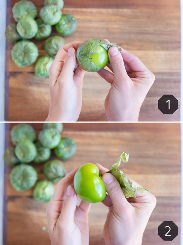 A tomatillo is prepared by peeling the husk off.