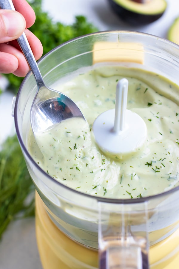 Easy avocado dressing is made in a food processor.