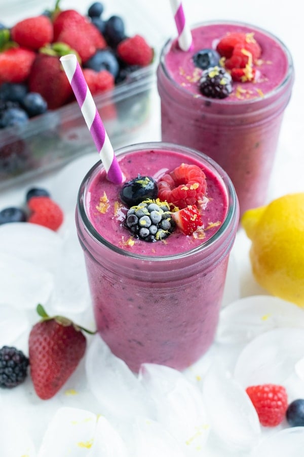 Mixed Berry Smoothies are a thick drink enjoyed with berries and fresh lemon zest.