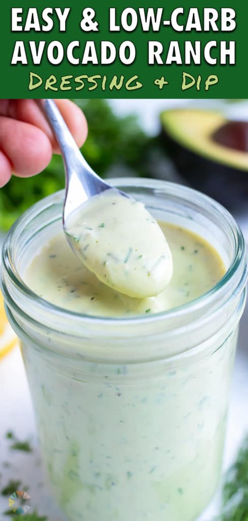 A spoon is shown lifting the avocado ranch dressing from the jar.