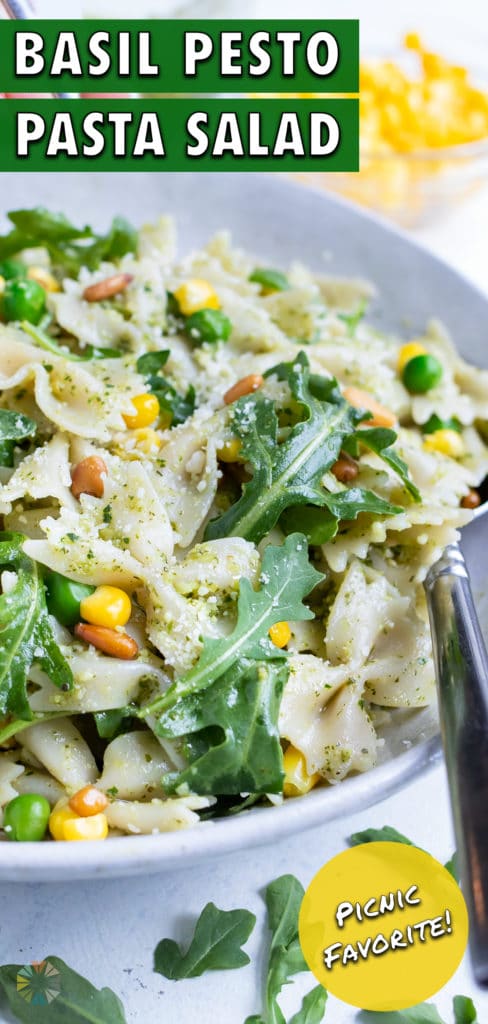 A bowl of pesto pasta salad is served for a healthy side dish.