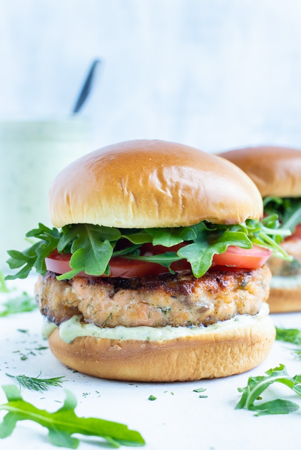 The salmon burgers are placed on the counter for a healthy meal.