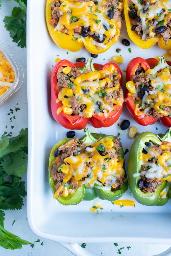 Taco stuffed bell peppers are shown after baking in the oven.