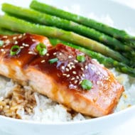 Tender and flaky salmon is served with a homemade teriyaki sauce and rice.