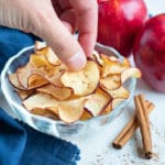 Easy-to-make Apple Chips are served in a bowl for a healthy, sweet snack.
