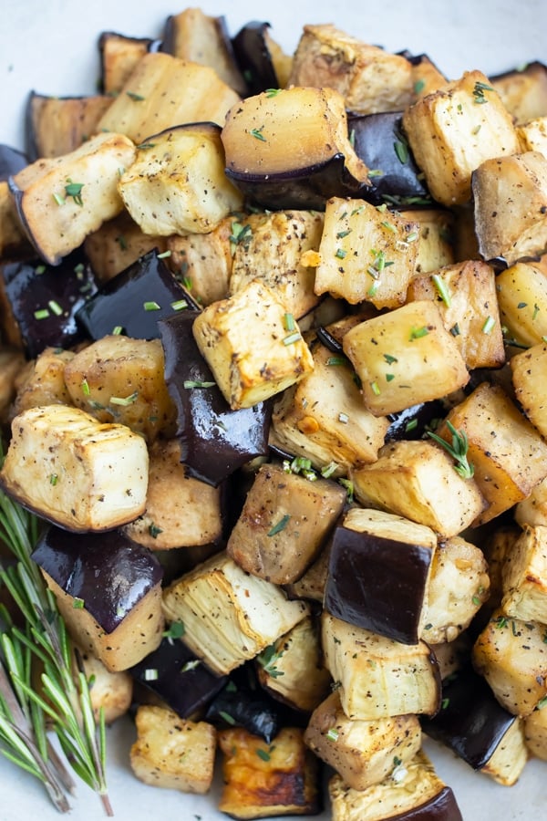 Air fryer eggplant is shown with a crispy golden outside.