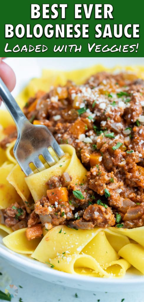 A fork is used to enjoy Italian Beef Bolognese and pasta.