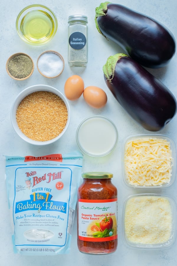 Eggplant, Parmesan cheese, breadcrumbs, flour, egg, cheese, seasonings, and tomato sauce are the ingredients for this recipe.