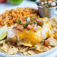 Fiesta lime chicken is placed on top of tortilla chips.