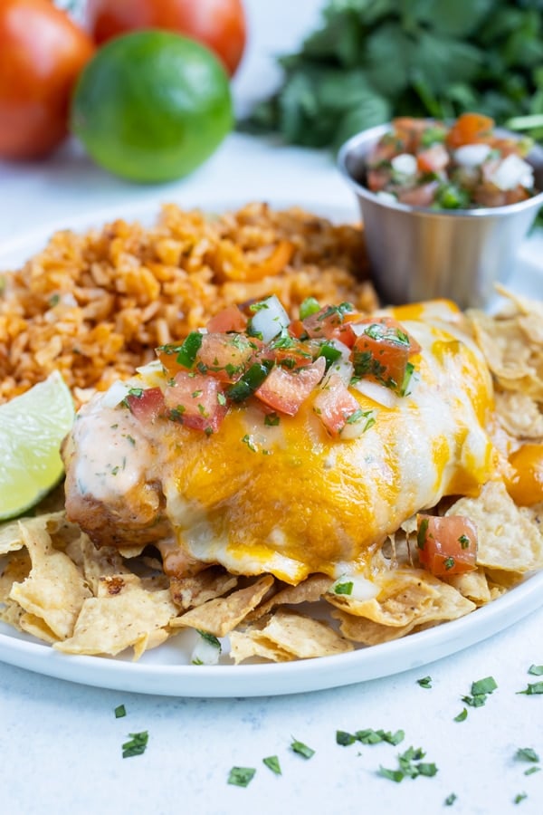 Fiesta lime chicken is placed on top of tortilla chips.