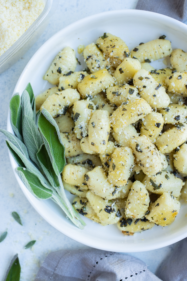 A bowl full of gnocchi is served for an Italian inspired meal.