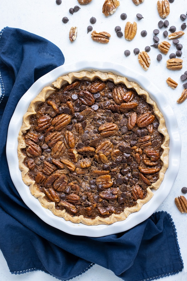 Chocolate chip pecan pie is served for a holiday dessert.