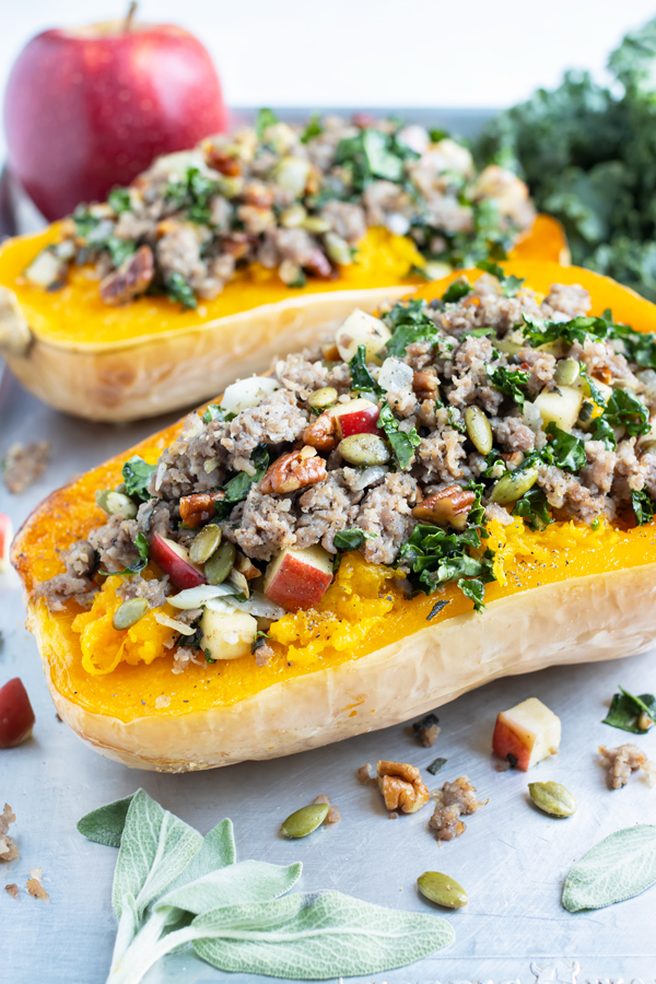 Butternut squash is loaded with a sausage, kale, and apple filling.