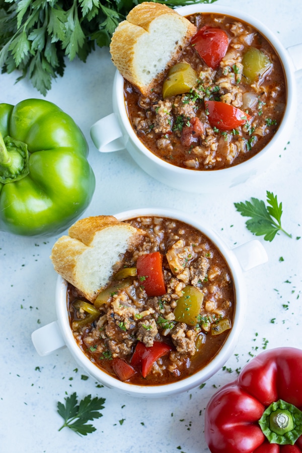 Gluten-free stuffed pepper soup are set on the counter.