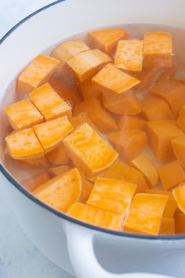 The sweet potatoes are boiled until tender.