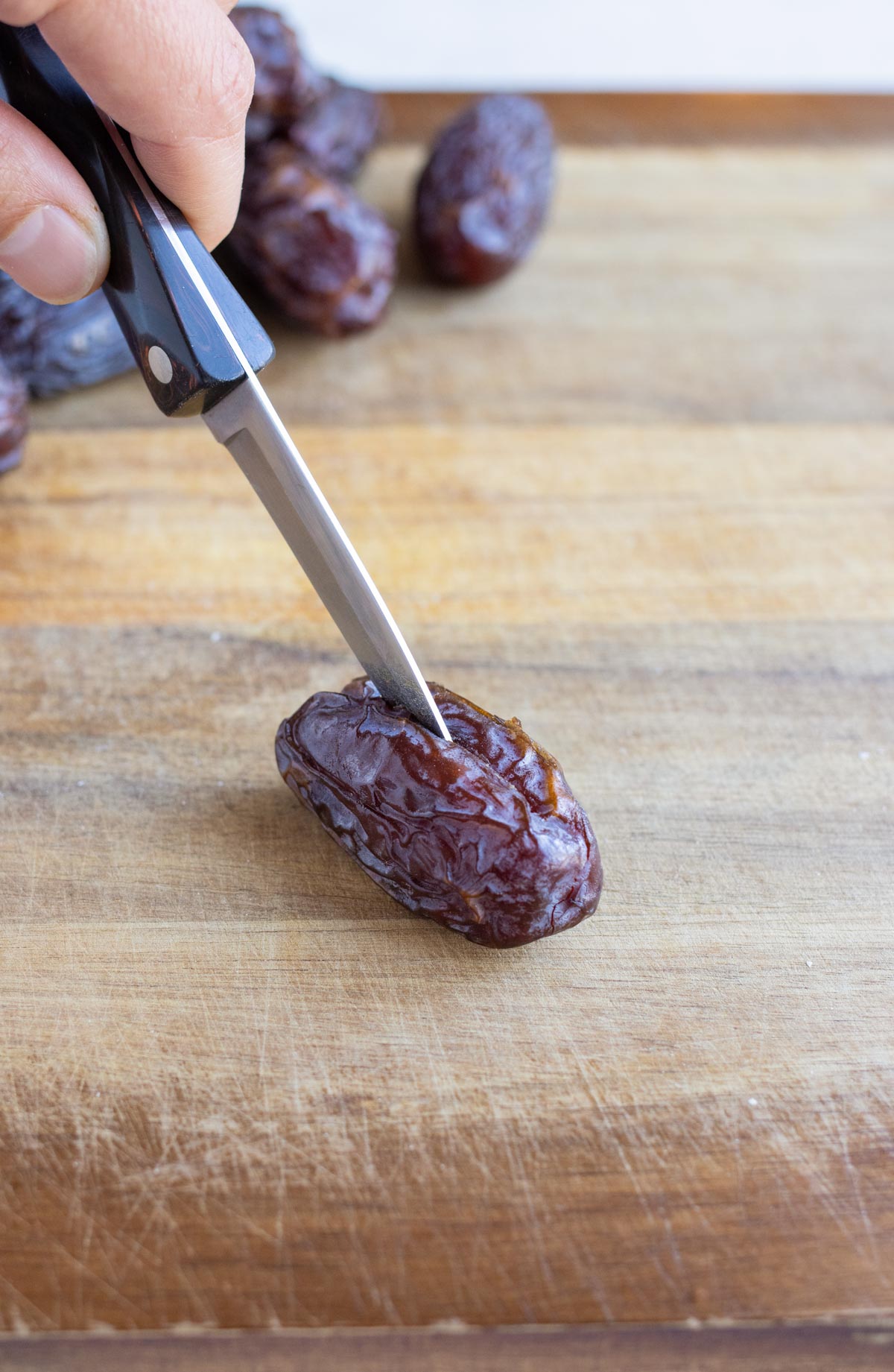 The medjool dates are slit down the center.