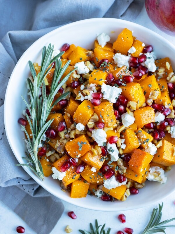 An overhead shot is used to show a bowl of butternut squash and goat cheese.