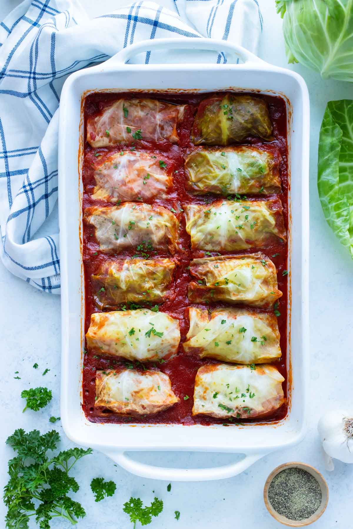 Cabbage Rolls are served in a 9x13 casserole dish.
